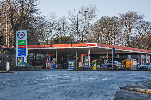 Edinburgh, Scotland - January 6 2021: Esso MFG Windmill petrol station located on Queensferry Road near Craigleith in Edinburgh.