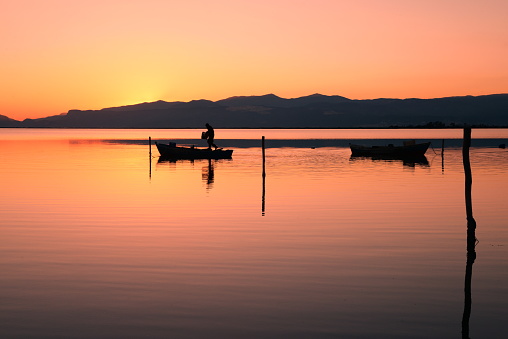 wonderful sunset fishermen in Silifke Dalyan