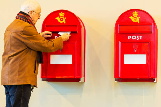 Close up of red Danish mailboxes