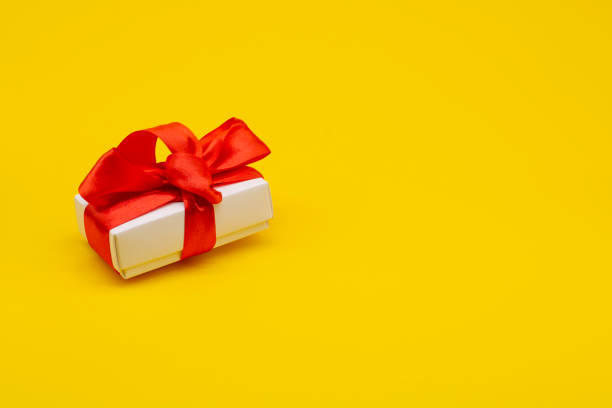 istock gift craft box on a yellow background. Valentine's Day. 1294942153