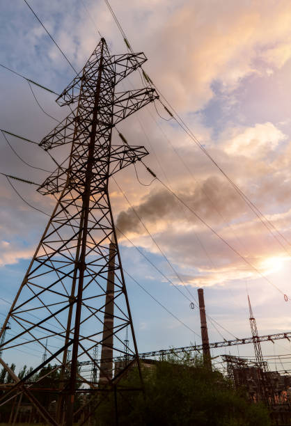 istock High-voltage power lines. Electricity distribution station, high voltage electric transmission tower 1294943201