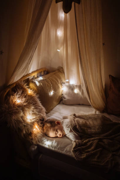 istock Little preschool girl sleeping in comfortable bed 1294943626