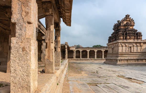 istock Desolated square and small shrine at Krishna Temple, Hampi, Karnataka, India. 1294946035
