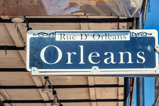 Orleans street name sign in the French Quarter, old town New Orleans Louisiana USA on a sunny day.