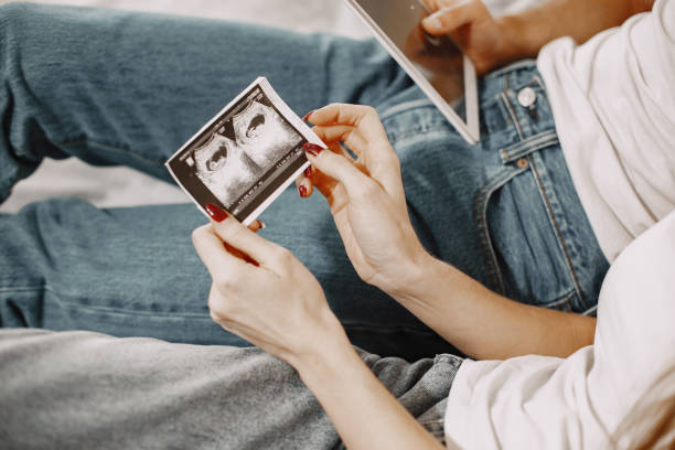istock Couple look to ultrasound dignosticsphoto 1294948594