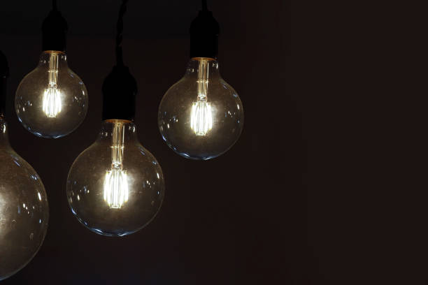 istock old electric lamps in dark scenery 1294950082