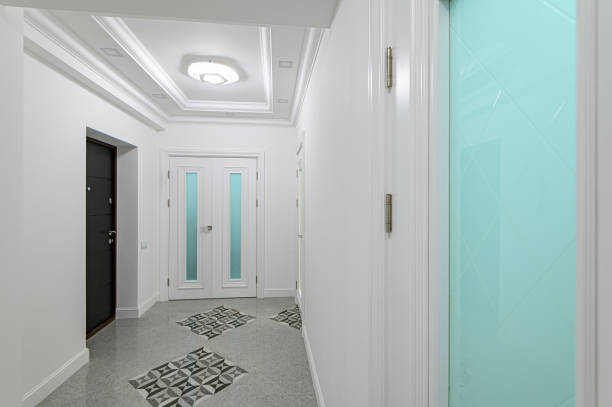 istock interior of white corridor with doors 1294950839