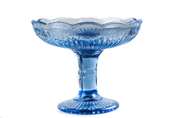 istock Empty blue glass vase for fruit or sweets isolated on white background 1294957656