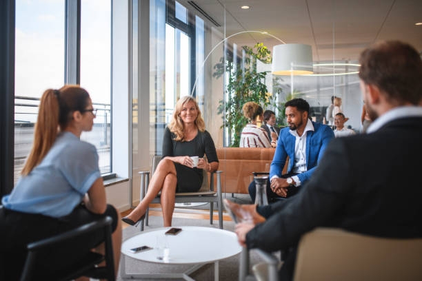 istock Relaxed Business People Talking Before Start of Seminar 1294958541