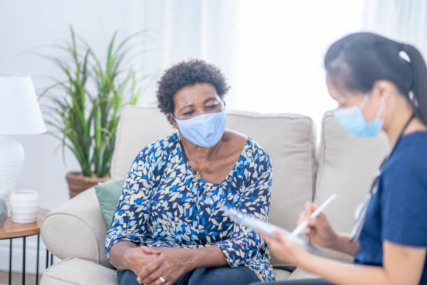 istock Doctor visits senior patient at home 1294959560