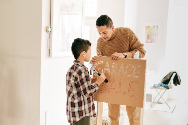 istock HIspanic family indoor.Dad and son assembling new stand together 1294959662