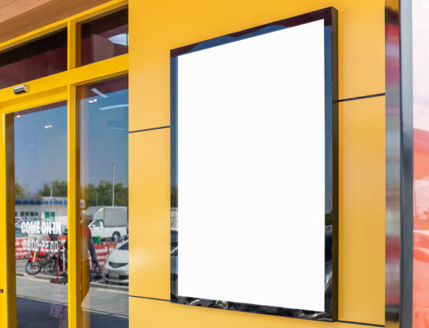 istock Mockup image of Blank billboard white screen posters and led outside storefront for advertising 1294961317