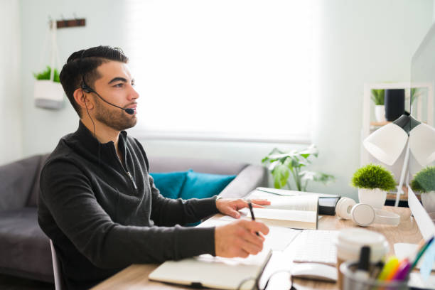 istock Side view of a young man working as an interpreter 1294963169