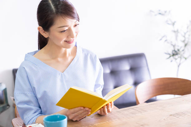 istock asian woman who reads a book 1294965144