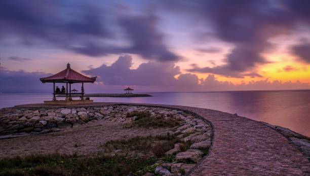 istock Enjoy the sunrise at mertasari 1294965713