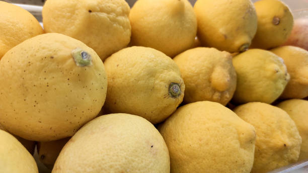 istock Many fresh lemons sell on market 1294967483