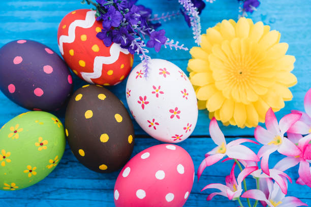 istock Easter eggs top view on blue wooden background 1294974337
