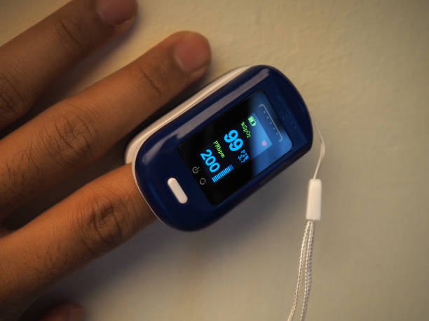 Picture of fingertip pulse oximeter that use for measuring oxygen saturation level on blood and also heart rate Picture of fingertip pulse oximeter that use for measuring oxygen saturation level on blood and also heart rate pulse oxymeter stock pictures, royalty-free photos & images