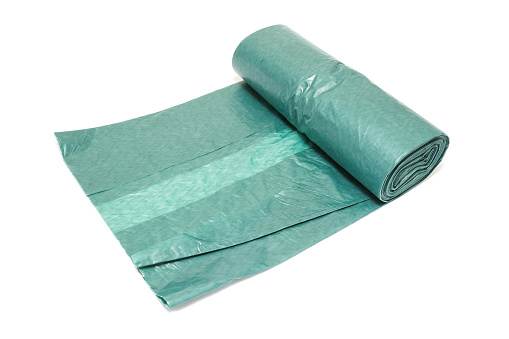 a new roll garbage bag on white background