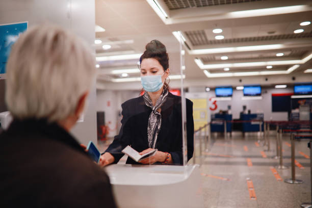 istock Handling agent at the airport checking covid passport 1294976790