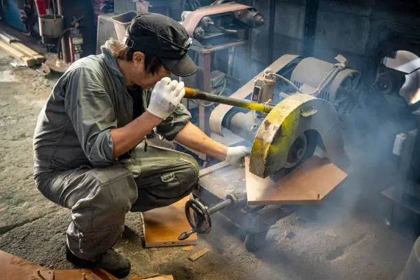 Photo of Craftsmen of the ironworks in the downtown area doing their best.