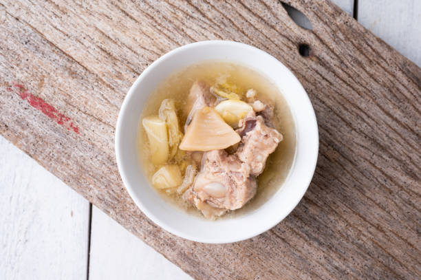 istock Pickled lettuce soup with spare ribs pork bone soup bowl with vegetable 1294982614