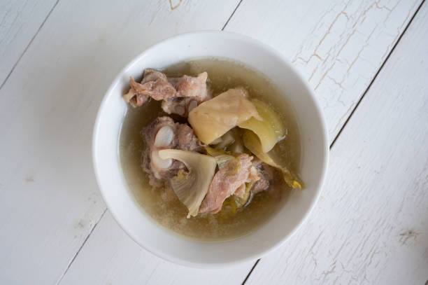 istock Pickled lettuce soup with spare ribs pork bone soup bowl with vegetable 1294982617
