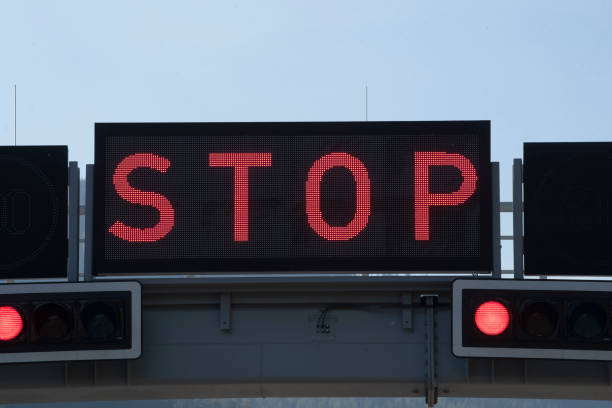 istock red stop sign in traffic 1294984229