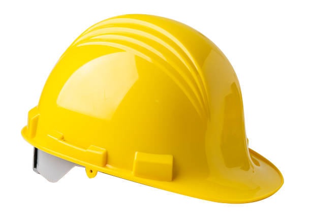 istock Yellow construction helmet isolated on white background with clipping path, engineer safety concept. 1294989399