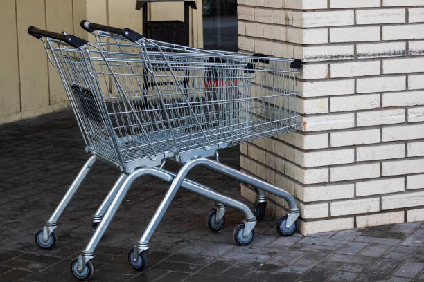 istock Shopping carts at a brick wall in the street 1294991978