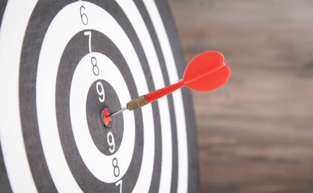 istock Dart arrow in the dartboard. Success 1294997023