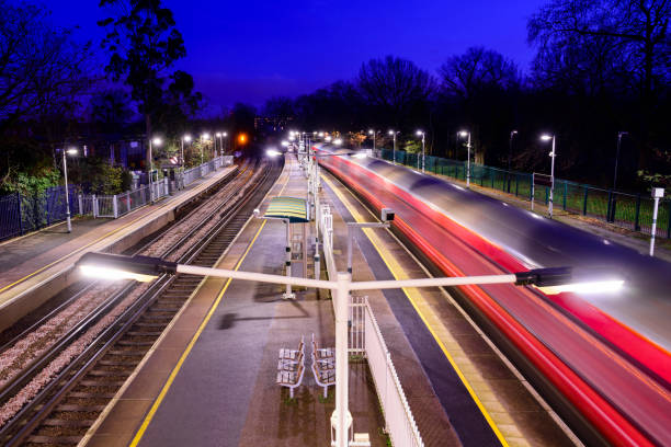 istock Passenger train moving through suburban London at twilight 1294999094