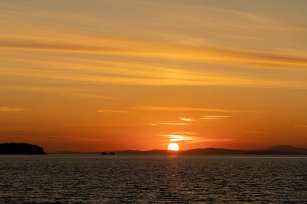 istock Seascape with a beautiful sunset on the horizon. 1294999889