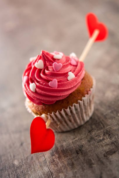 istock Cupcake decorated with sugar hearts for Valentine's Day 1295006410
