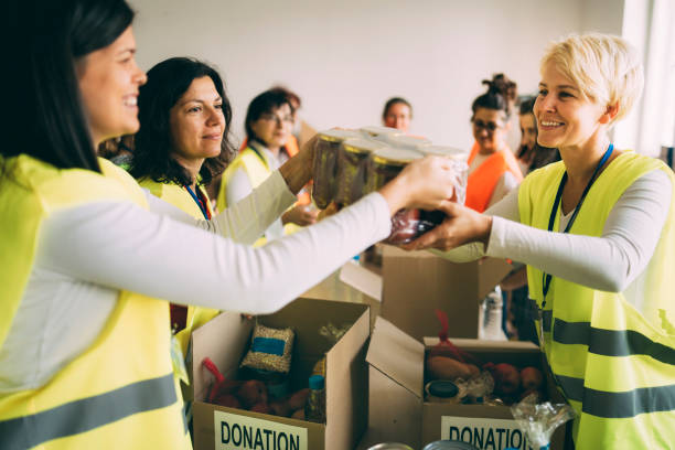 istock Charity workers during their work in donation 1295008991