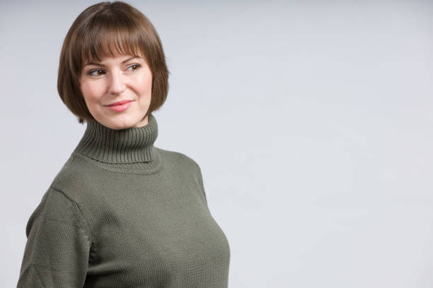 istock young beutiful woman in a turtleneck 1295009007