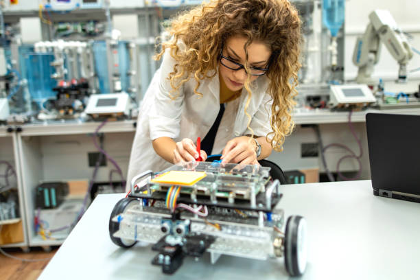 istock Beautiful young female engineers works in laboratory 1295009062
