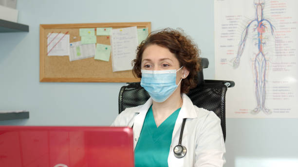 istock Female doctor in online appointment 1295011095