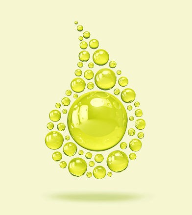 Shiny spheres in the shape of olive oil drop. 3D rendering