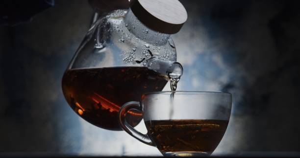 istock Pouring a cup of natural black tea 1295012397