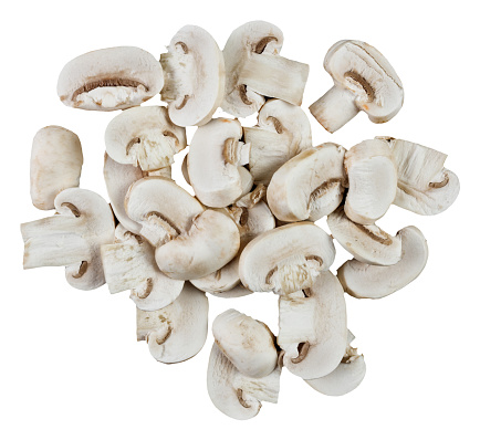 Set of fresh whole and sliced champignons