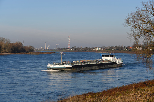 Duesseldorf, December 19, 2020 - The gas tank ship Shakira drive the river Rhein upstream at the height of Duesseldorf Wittlaer upstream the river Rhine.