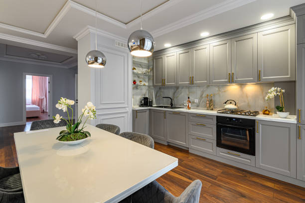 istock Luxury grey and white modern kitchen and living room 1295014889