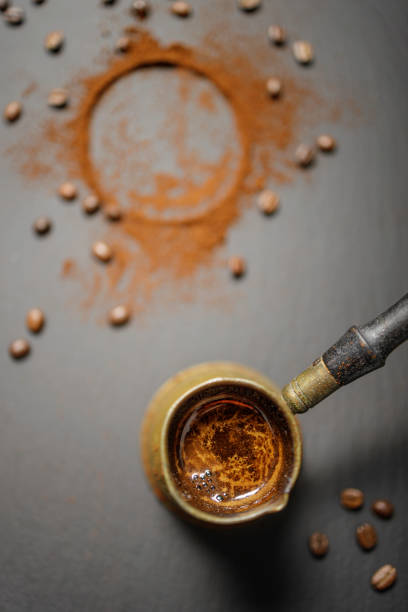 istock Turkish copper coffee pot with roasted coffee beans 1295017210