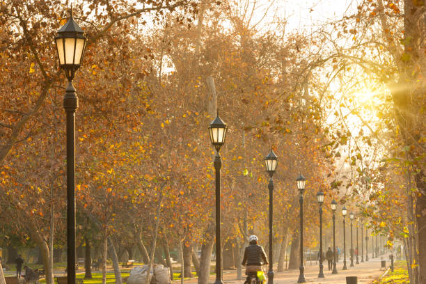 Santiago, Region Metropolitana, Chile - June 07, 2016: An autumn evening in Parque Forestal, the most traditional and emblematic park in downtown Santiago.