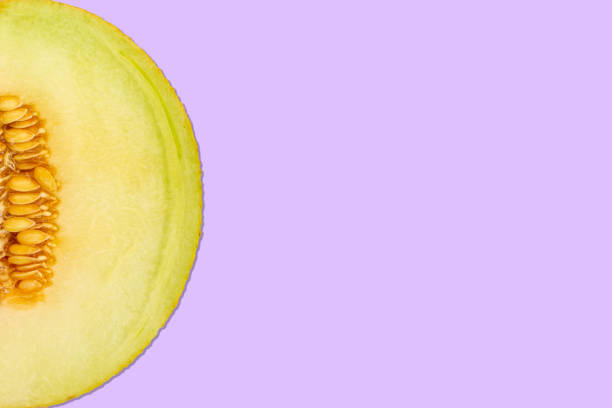 Background - tasty galia melon (cucumis melo) with copy space - purple