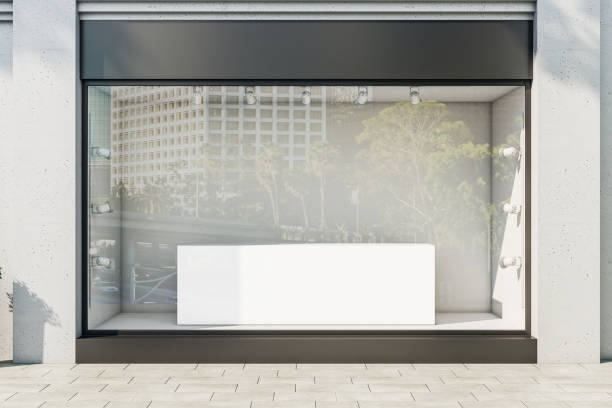istock Modern boutique with blank glass showcase and pedestal. 1295019306
