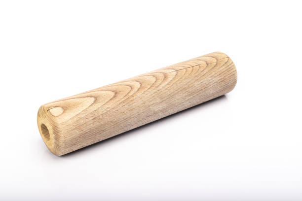 istock wooden rolling pin on white background 1295019746