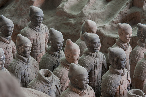 Xi'an, China – February 12, 2023: Shots of the Terracotta Warriors, depicting the armies of Qin Shi Huang, the first emperor of China. The figures stand within pits located at the Emperor Qinshihuang's Mausoleum Site Museum