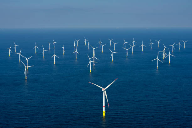 Alternative energy. Aerial view of offshore windmill park at sea. This photo was taken on April 12, 2019 above the Rentel wind farm on the Belgian North Sea offshore wind farm stock pictures, royalty-free photos & images